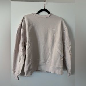 Medium tan North Face crew neck
